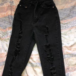 High waist , distressed jeans